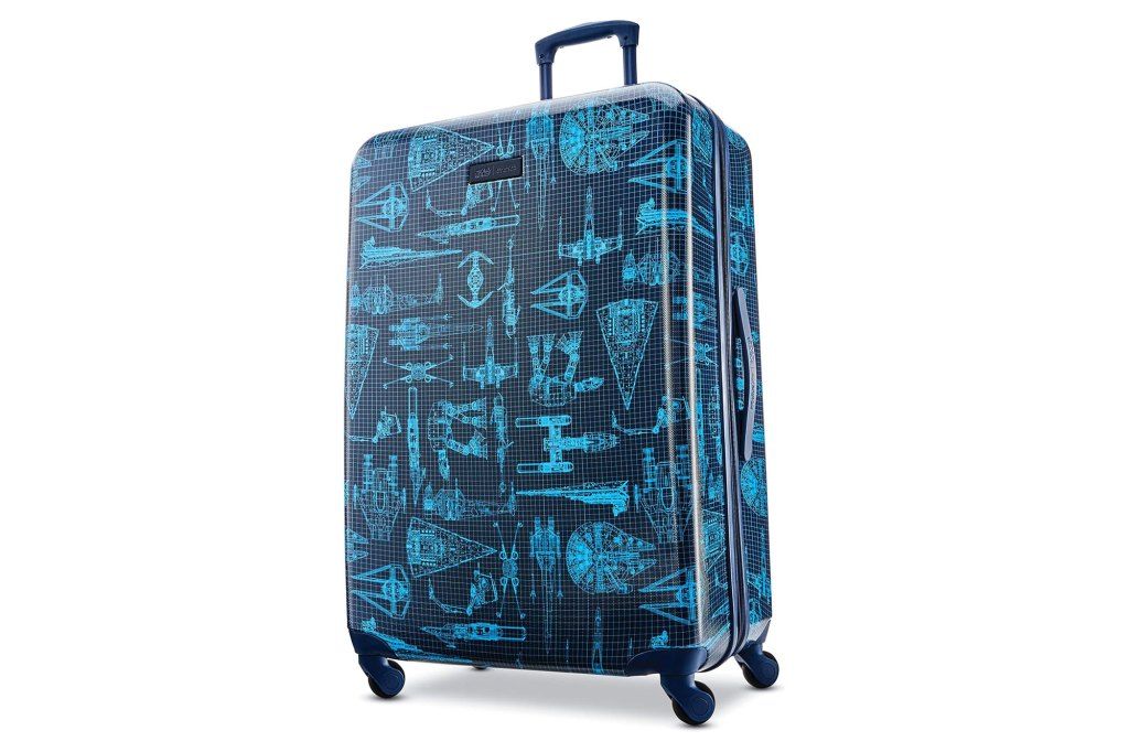 Une valise bleue avec un motif dessus